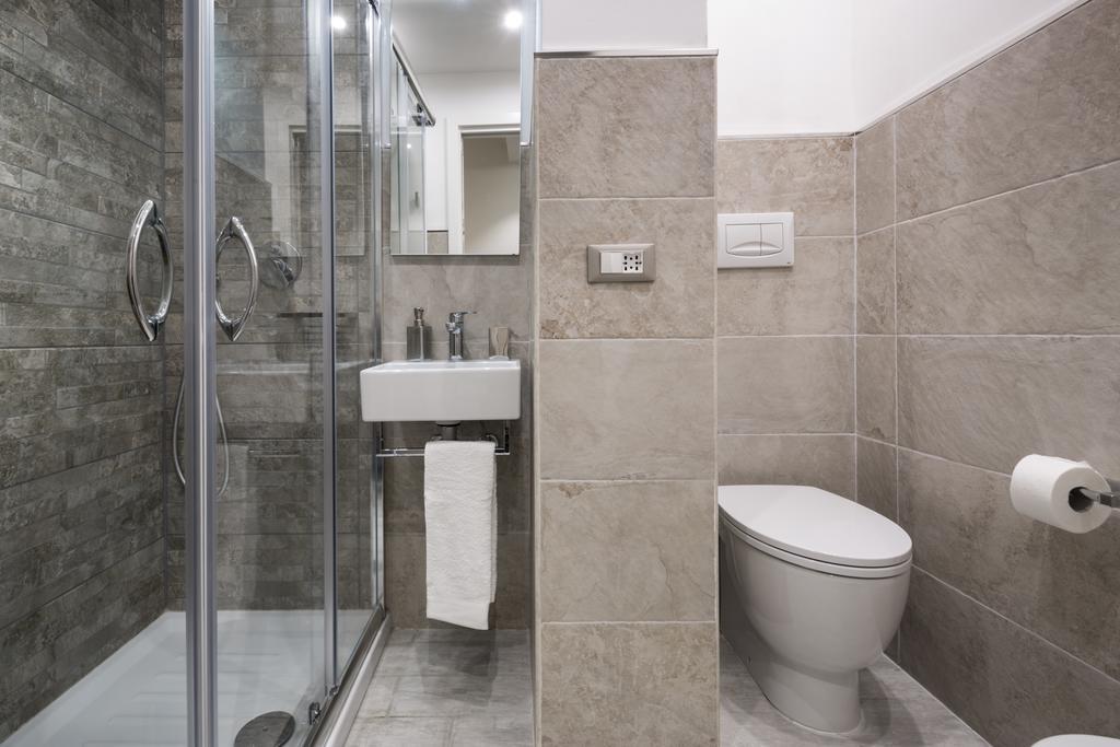 Piazza Martiri Rooms Каляри Стая снимка